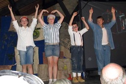 Boy Campers spell YMCA with arms