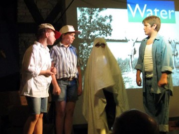 Boys dress Hubey up as ghost