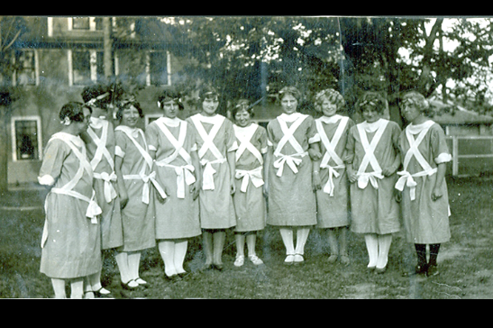 Dahl Girl staff criss cross outfits